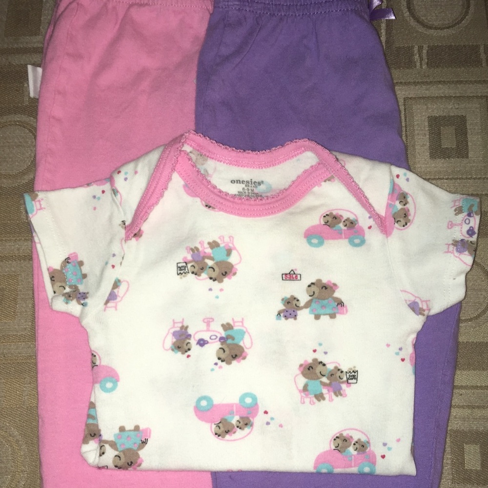 2 pairs of 6/9 month pants and onesie